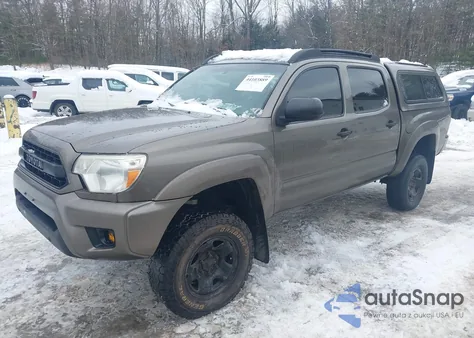 2013 Toyota Tacoma Base V6 z USA, uszkodzony, nr VIN 5TFLU4EN7DX058066